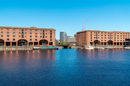 The Royal Albert Dock reflects on the calm water in Liverpool