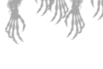 Fototapeta premium Spooky shadow of skeletal hands reaching down creating a halloween atmosphere isolated on transparent background