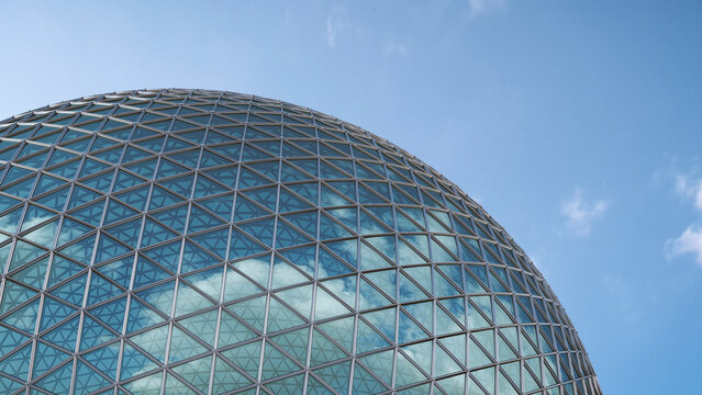 Part of glass dome with reflection of clouds, 3D Rendering
