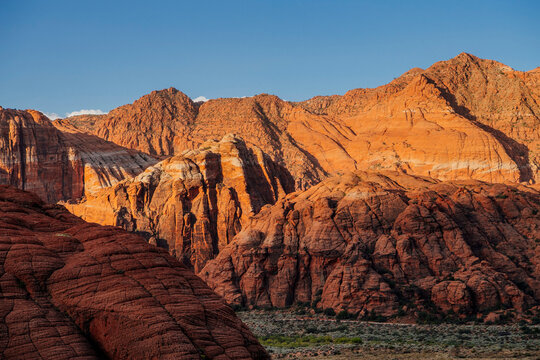 Red cliffs and rugged desert rock formations