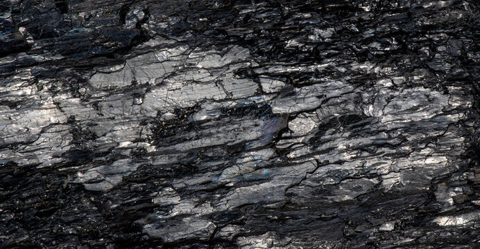 Black shiny anthracite coal mineral texture background