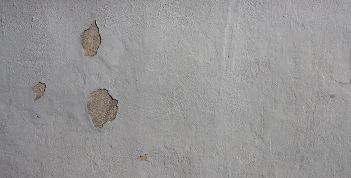 Grey peeling concrete wall texture background