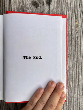 Open book showing &ldquo;The End&rdquo; concept, symbolizing completion, closure, achievement, and the final stage of a journey.