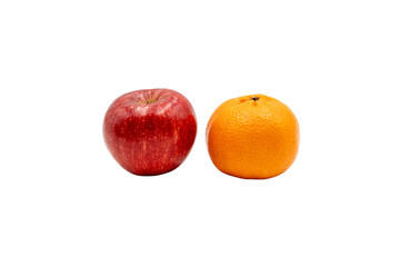 Fresh red apple and ripe orange standing side by side on a transparent Background, showing a simple healthy fruit comparison with copy space. © Mukta