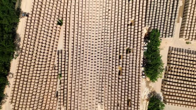 Aerial view of a brick factory yard and raw material