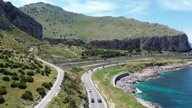 Aerial views of Sferracavallo coastal road and Mediterranean shoreline in Palermo, Sicily