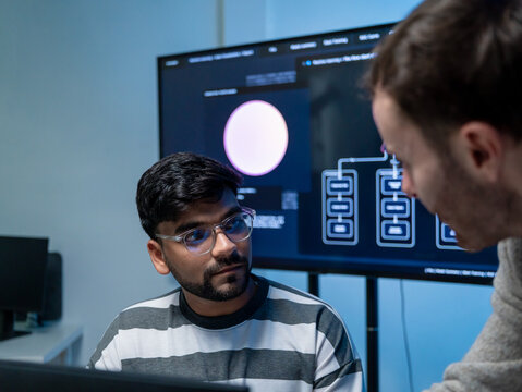 Software engineering use computer working development office are assisting algorithm systems or verifying code. Programmer teamwork using artificial intelligence on laptop analysis or writing coding