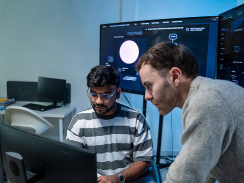 Software engineering use computer working development office are assisting algorithm systems or verifying code. Programmer teamwork using artificial intelligence on laptop analysis or writing coding