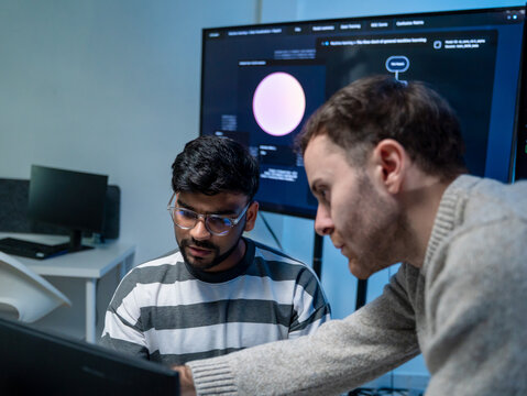 Software engineering use computer working development office are assisting algorithm systems or verifying code. Programmer teamwork using artificial intelligence on laptop analysis or writing coding