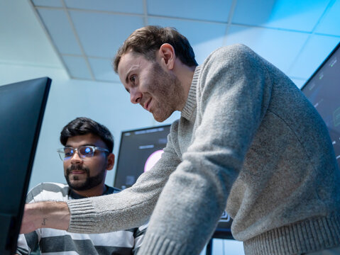 Software engineering use computer working development office are assisting algorithm systems or verifying code. Programmer teamwork using artificial intelligence on laptop analysis or writing coding
