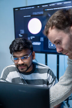 Software engineering use computer working development office are assisting algorithm systems or verifying code. Programmer teamwork using artificial intelligence on laptop analysis or writing coding