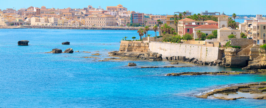 Panoramic view historic waterfront Syracuse in Sicily along the Mediterranean coastline ancient Greek town travel destination site