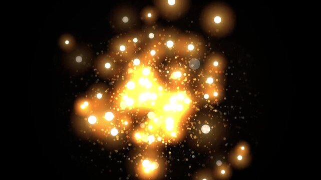Golden glitter particles floating on black background for festive celebration and motion graphics