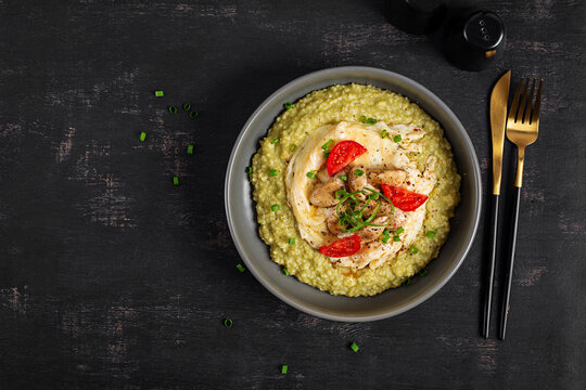 Millet Porridge with Pesto Sauce, Omelet and Sauteed Mushrooms. Top view