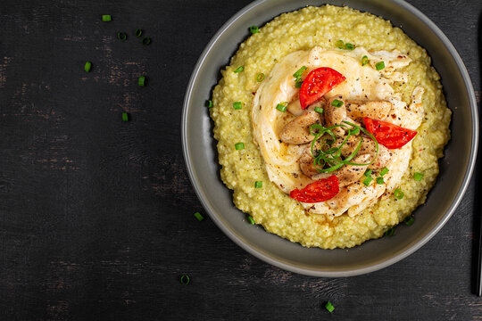 Healthy Millet Breakfast Bowl with Omelet and Mushrooms. Top view