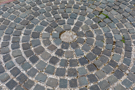Concentric Circle Cobblestones Decorative Pavement at Street