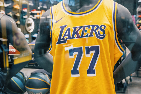 July 28, 2026, Belgrade, Serbia: Sports merchandise store display featuring Lakers NBA jersey number 77 on mannequin.