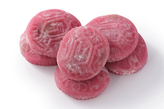 Traditional pink red turtle rice cake isolated on white background with clipping path