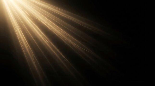 Golden sun rays light beams shining from top corner on black background, warm lens flare overlay effect