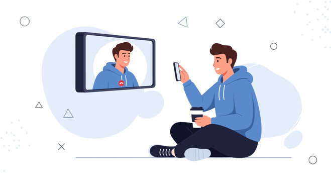 Man Video Calling Friend on Phone with Tablet Displaying Call Screen, Casual Lifestyle