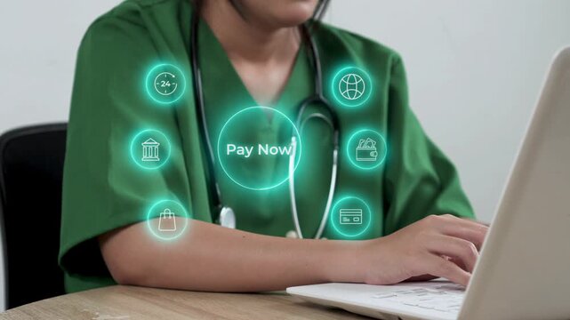 Close up of Nurse making successful online payment on laptop using virtual pay now button interface