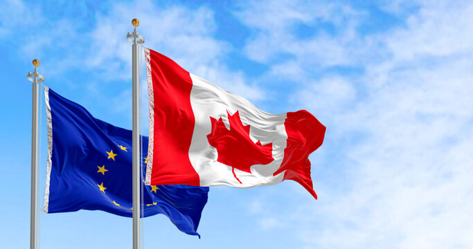 Flags of European Union and Canada waving together