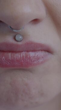 Close-up portrait of nervous and angry woman pursing lips expressing negative emotion. Unhappy person and face expression concept.