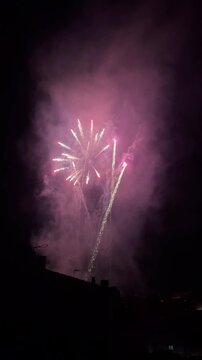 Spectacular fireworks show exploding at night in Olot, Spain