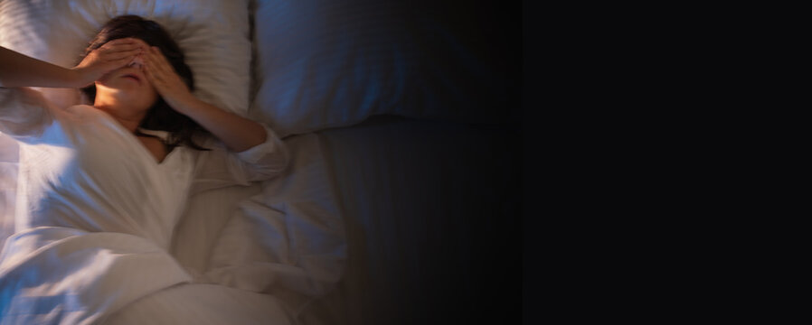 poor sleep, nightmare, woman sleeping in bed and having bad dreams, anxiety and stress, depression, loneliness banner copy space