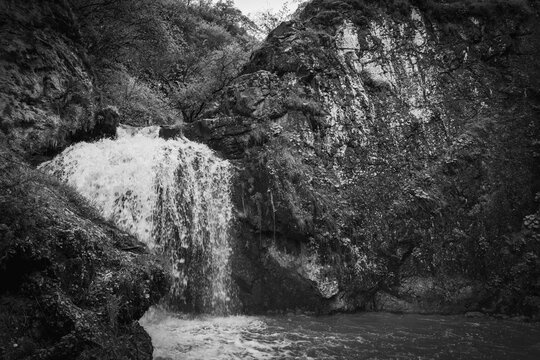 Honey waterfalls, black and white photo. This is a group of waterfalls on the Alikonovka and Echki-Bash rivers in Karachay-Cherkessia. Natural landscape photography