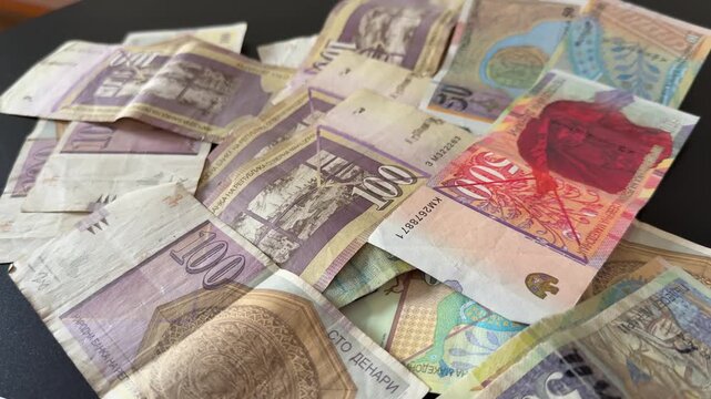 North Macedonia Denar Banknotes Spread on Table Showing Macedonian Currency and Cash