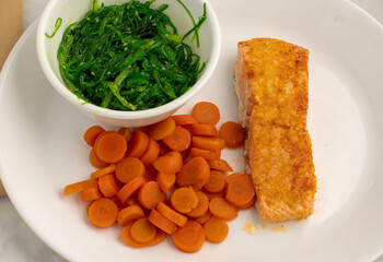 baked salmon  with  seaweed salad © dmiller324