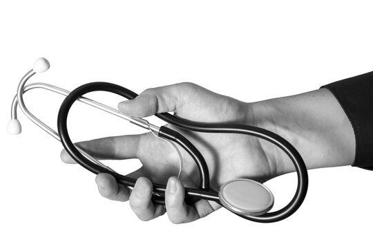 The doctor's hand holds a stethoscope against a white background.