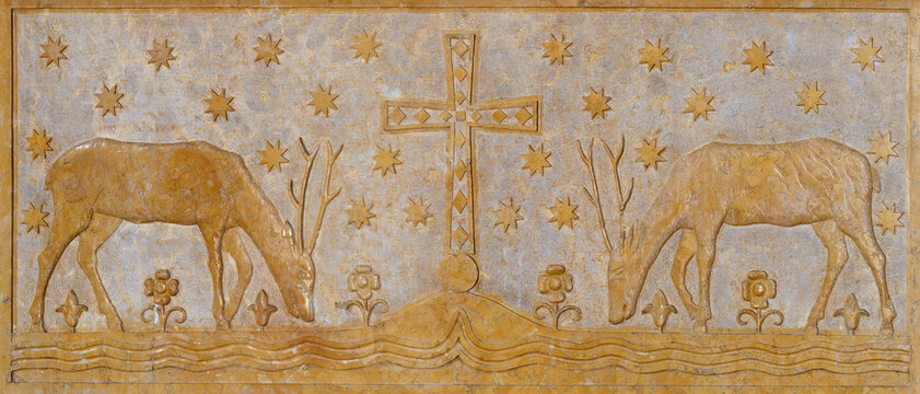 Monza - The relief of cross among the deer on the altar - menzua in the church Chiesa di San Carlo by unknown artist.