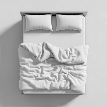 Bed with Soft White Pillows and Crumpled Duvet Perfect for Sleep