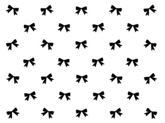 Fototapeta premium Minimalist black ribbon bow seamless pattern on white background - Trendy coquette aesthetic design for fashion textiles, wrapping paper, feminine branding, and digital wallpapers.