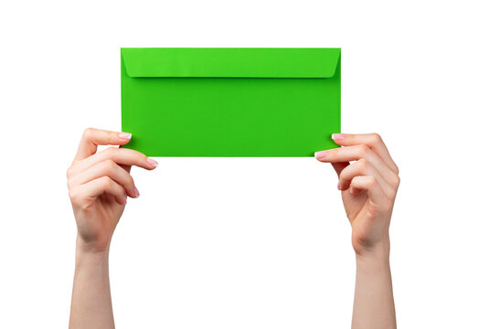 Hands holding a green envelope in front of a white background