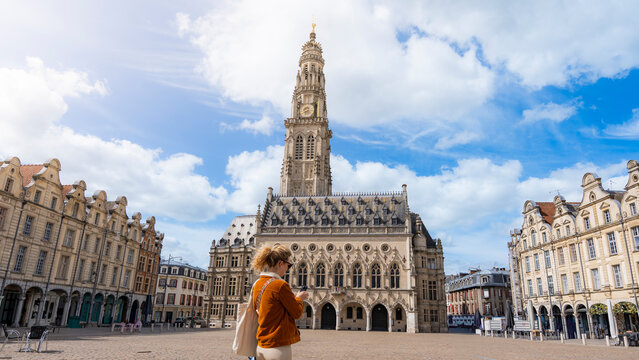 Tourist at Arras town square and belfry in France