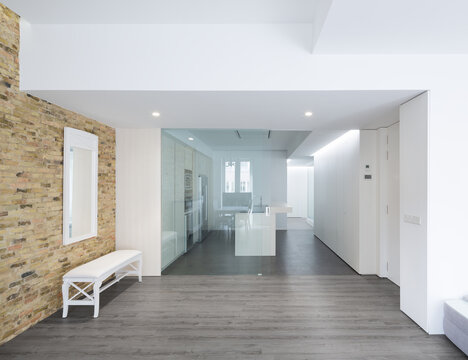 Luxury minimalist house interior with exposed brick wall