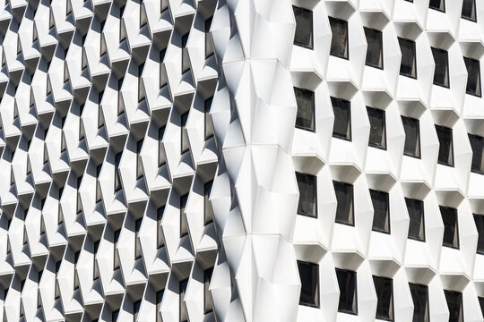 Abstract geometric facade of a modern city building