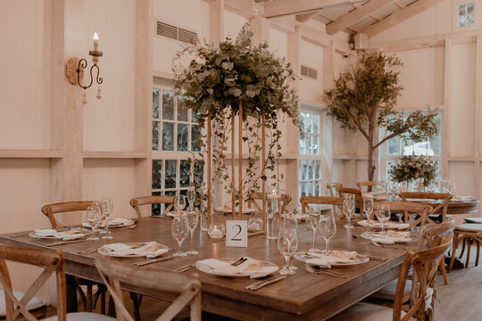 Elegant wedding reception table with floral centerpiece