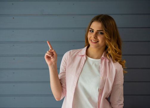 Woman Pointing Upward.