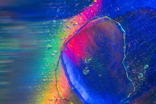 Neon abstract ice texture with colorful powder explosion