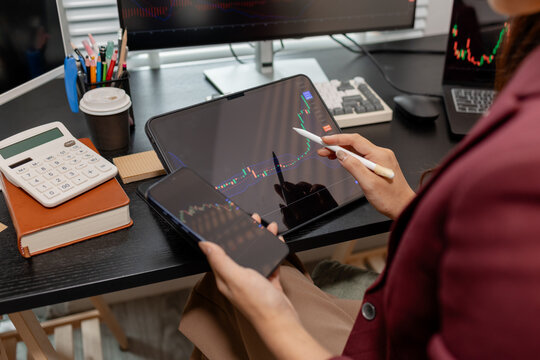 Professional trader monitoring financial markets and analyzing investment opportunities across multiple trading platforms, representing stock analysis, market research.