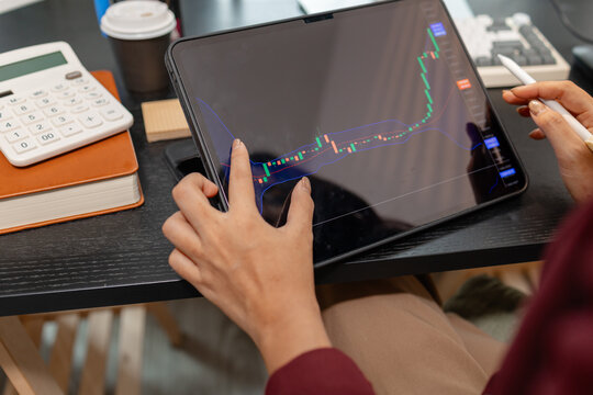 Professional trader monitoring financial markets and analyzing investment opportunities across multiple trading platforms, representing stock analysis, market research.