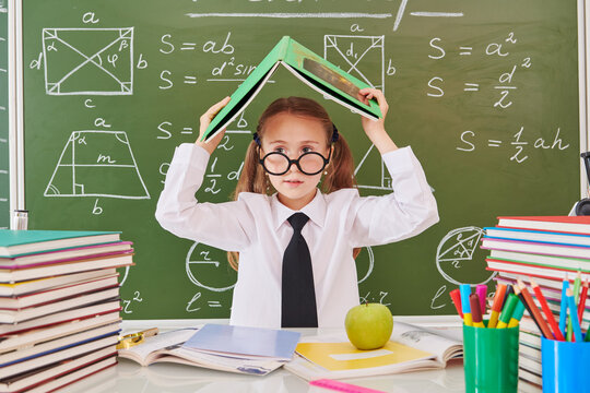 Playful Schoolgirl Studying