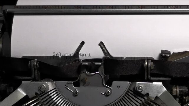 Close Up Overhead Shot of Vintage Typewriter Typing Selamat Hari Sumpah Pemuda