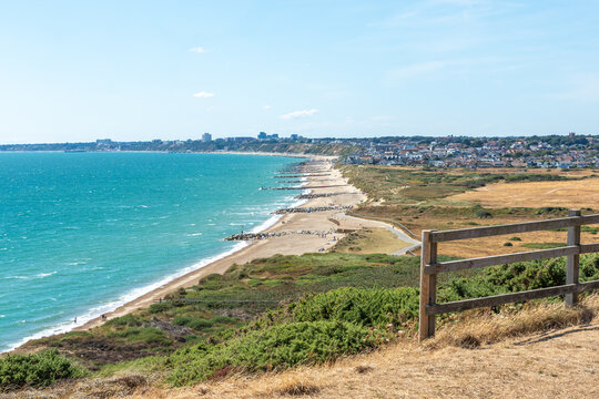 Warren Hill, Hengistbury Head, UK - August 7th 2026: Hilltop view of the beach and Southborne Town.