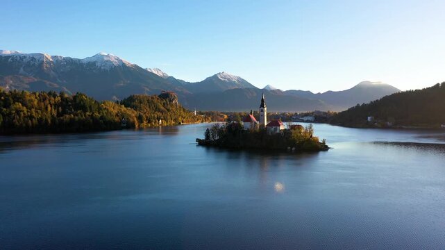 Lake Bled island and Julian Alps in autumn Slovenia