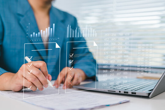 Businessman reviewing performance reports and compliance checklist on digital dashboard, data analytics, financial auditing, project management, reporting accuracy, and corporate governance.